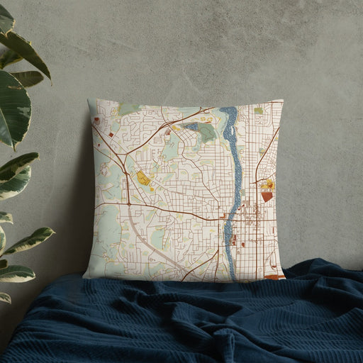 Custom Phenix City Alabama Map Throw Pillow in Woodblock on Bedding Against Wall