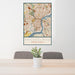 24x36 Philadelphia Pennsylvania Map Print Portrait Orientation in Woodblock Style Behind 2 Chairs Table and Potted Plant