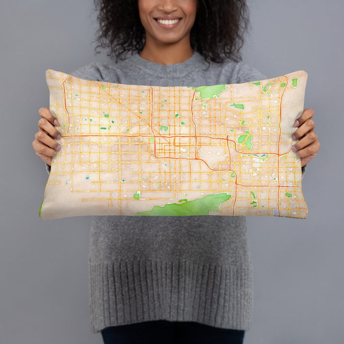 Person holding 20x12 Custom Phoenix Arizona Map Throw Pillow in Watercolor