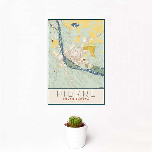 12x18 Pierre South Dakota Map Print Portrait Orientation in Woodblock Style With Small Cactus Plant in White Planter