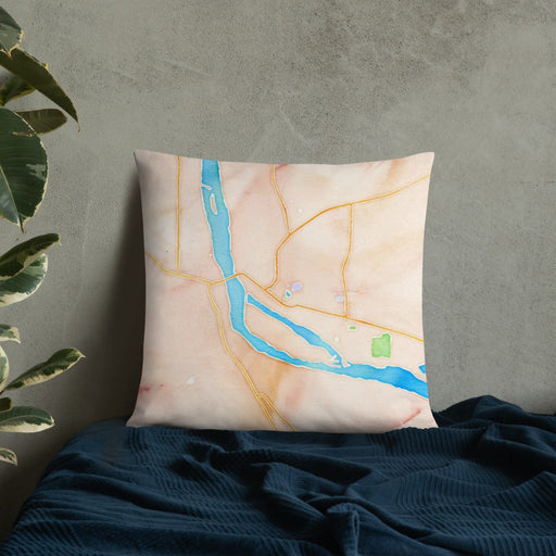 Custom Pierre South Dakota Map Throw Pillow in Watercolor on Bedding Against Wall