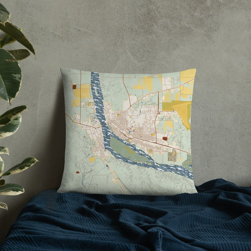 Custom Pierre South Dakota Map Throw Pillow in Woodblock on Bedding Against Wall