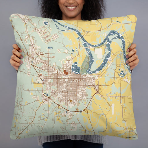 Person holding 22x22 Custom Pine Bluff Arkansas Map Throw Pillow in Woodblock