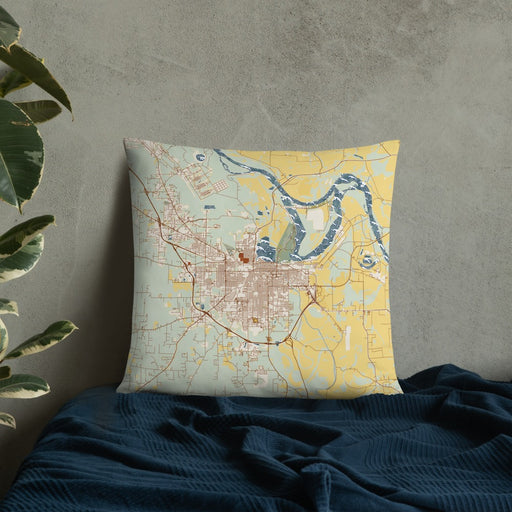 Custom Pine Bluff Arkansas Map Throw Pillow in Woodblock on Bedding Against Wall