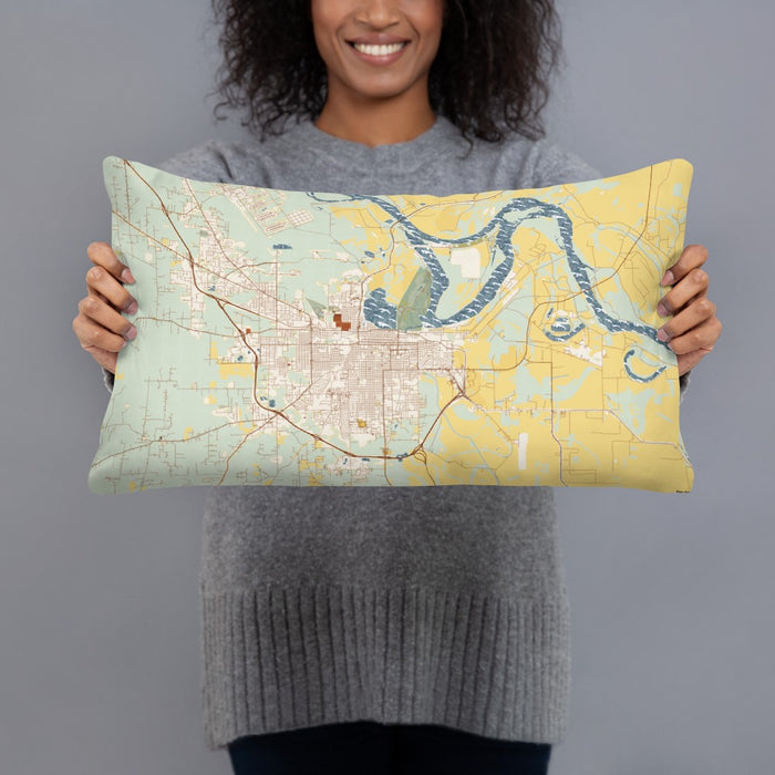 Person holding 20x12 Custom Pine Bluff Arkansas Map Throw Pillow in Woodblock