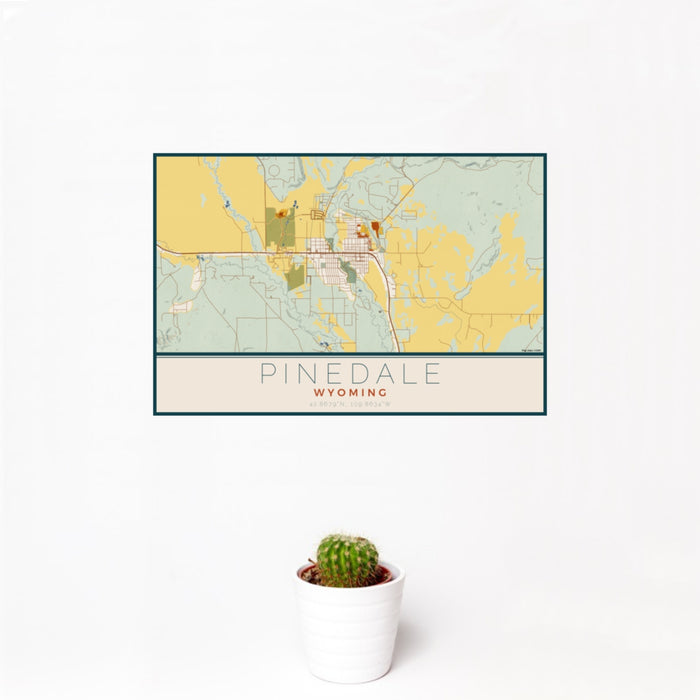 12x18 Pinedale Wyoming Map Print Landscape Orientation in Woodblock Style With Small Cactus Plant in White Planter