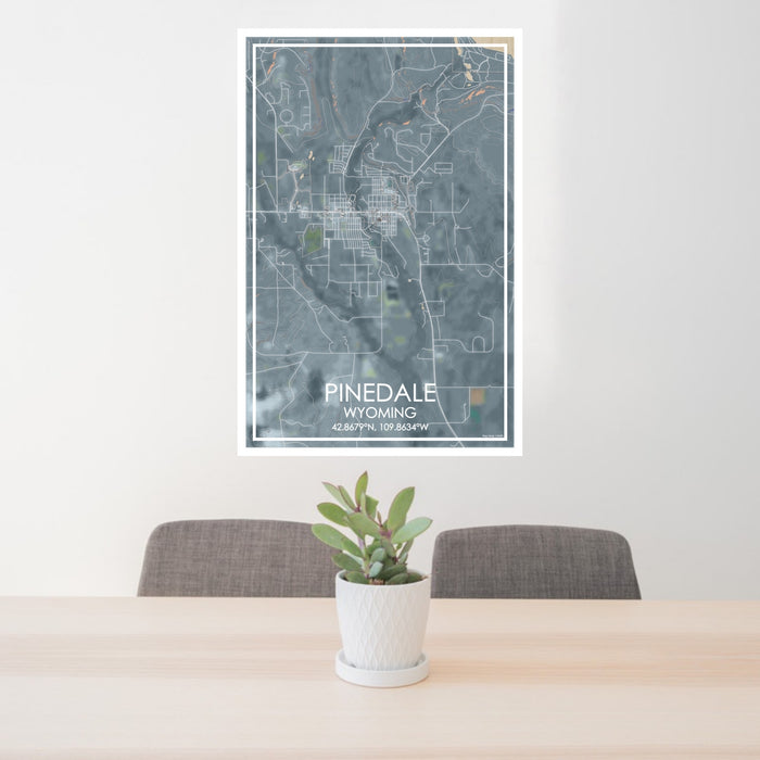 24x36 Pinedale Wyoming Map Print Portrait Orientation in Afternoon Style Behind 2 Chairs Table and Potted Plant
