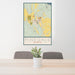 24x36 Pinedale Wyoming Map Print Portrait Orientation in Woodblock Style Behind 2 Chairs Table and Potted Plant