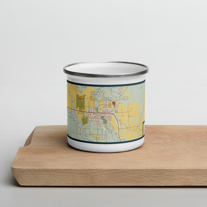 Front View Custom Pinedale Wyoming Map Enamel Mug in Woodblock on Cutting Board