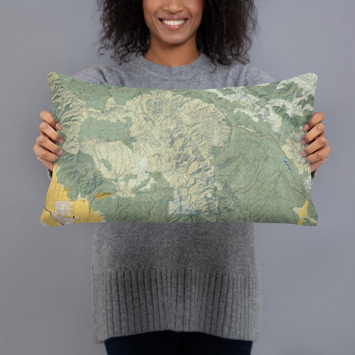 Person holding 20x12 Custom Pinnacles National Park Map Throw Pillow in Woodblock