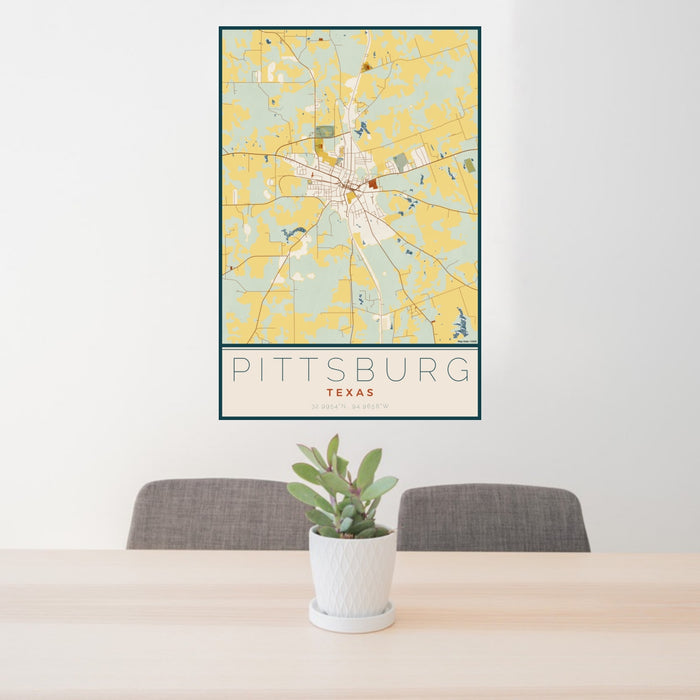 24x36 Pittsburg Texas Map Print Portrait Orientation in Woodblock Style Behind 2 Chairs Table and Potted Plant