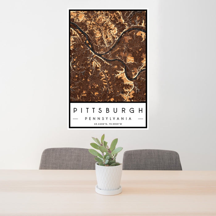 24x36 Pittsburgh Pennsylvania Map Print Portrait Orientation in Ember Style Behind 2 Chairs Table and Potted Plant