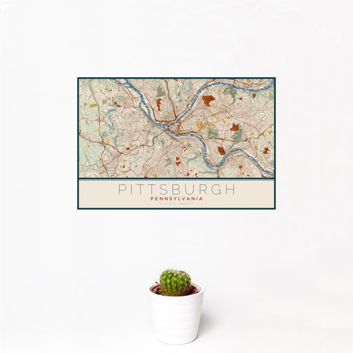 12x18 Pittsburgh Pennsylvania Map Print Landscape Orientation in Woodblock Style With Small Cactus Plant in White Planter