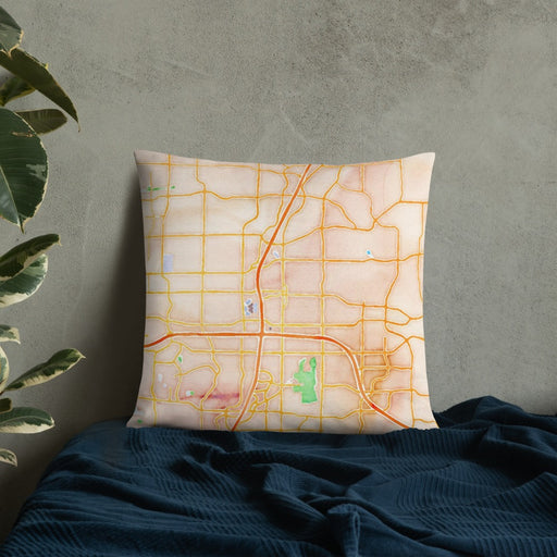 Custom Plano Texas Map Throw Pillow in Watercolor on Bedding Against Wall
