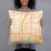 Person holding 18x18 Custom Plano Texas Map Throw Pillow in Watercolor