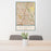 24x36 Plano Texas Map Print Portrait Orientation in Woodblock Style Behind 2 Chairs Table and Potted Plant