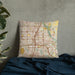 Custom Plano Texas Map Throw Pillow in Woodblock on Bedding Against Wall