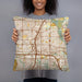 Person holding 18x18 Custom Plano Texas Map Throw Pillow in Woodblock