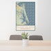 24x36 Plum Island Massachusetts Map Print Portrait Orientation in Woodblock Style Behind 2 Chairs Table and Potted Plant