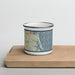 Front View Custom Plum Island Massachusetts Map Enamel Mug in Woodblock on Cutting Board