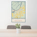 24x36 Plymouth North Carolina Map Print Portrait Orientation in Woodblock Style Behind 2 Chairs Table and Potted Plant