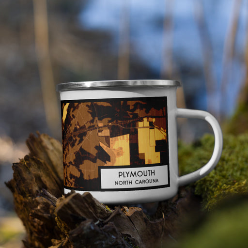 Right View Custom Plymouth North Carolina Map Enamel Mug in Ember on Grass With Trees in Background