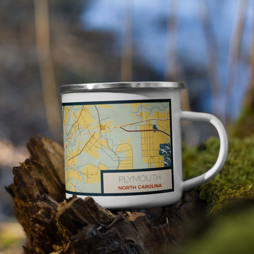 Right View Custom Plymouth North Carolina Map Enamel Mug in Woodblock on Grass With Trees in Background
