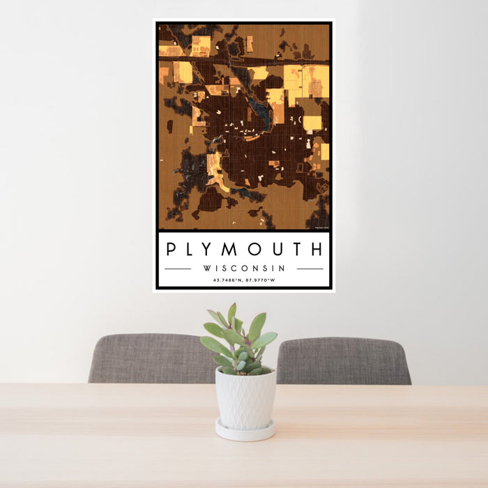 24x36 Plymouth Wisconsin Map Print Portrait Orientation in Ember Style Behind 2 Chairs Table and Potted Plant