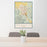 24x36 Pocatello Idaho Map Print Portrait Orientation in Woodblock Style Behind 2 Chairs Table and Potted Plant