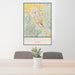 24x36 Pocatello Idaho Map Print Portrait Orientation in Woodblock Style Behind 2 Chairs Table and Potted Plant