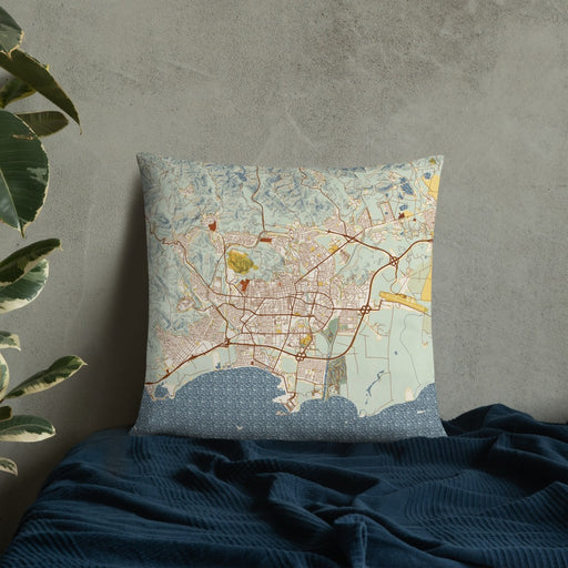 Custom Ponce Puerto Rico Map Throw Pillow in Woodblock on Bedding Against Wall