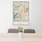 24x36 Pontiac Michigan Map Print Portrait Orientation in Woodblock Style Behind 2 Chairs Table and Potted Plant