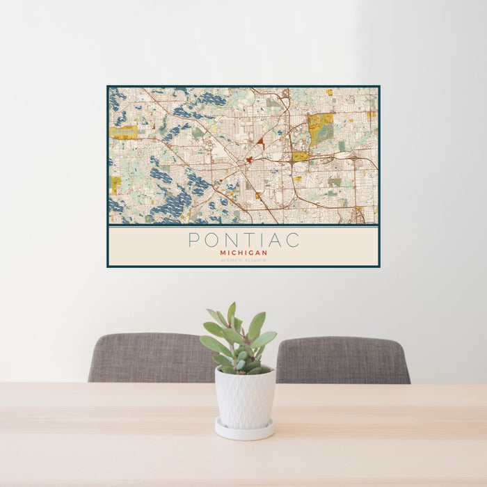 24x36 Pontiac Michigan Map Print Landscape Orientation in Woodblock Style Behind 2 Chairs Table and Potted Plant