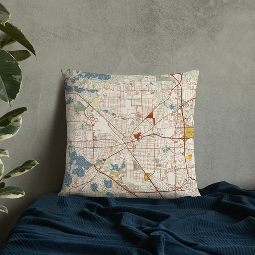 Custom Pontiac Michigan Map Throw Pillow in Woodblock on Bedding Against Wall