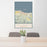 24x36 Port Angeles Washington Map Print Portrait Orientation in Woodblock Style Behind 2 Chairs Table and Potted Plant