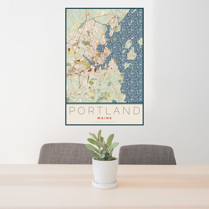 24x36 Portland Maine Map Print Portrait Orientation in Woodblock Style Behind 2 Chairs Table and Potted Plant