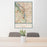 24x36 Portland Oregon Map Print Portrait Orientation in Woodblock Style Behind 2 Chairs Table and Potted Plant