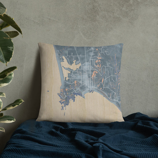 Custom Port Orford Oregon Map Throw Pillow in Afternoon on Bedding Against Wall