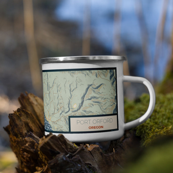 Right View Custom Port Orford Oregon Map Enamel Mug in Woodblock on Grass With Trees in Background