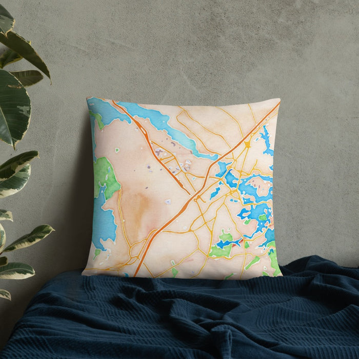 Custom Portsmouth New Hampshire Map Throw Pillow in Watercolor on Bedding Against Wall