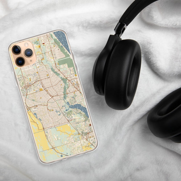 Custom Port St. Lucie Florida Map Phone Case in Woodblock on Table with Black Headphones