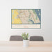 24x36 Port St. Lucie Florida Map Print Landscape Orientation in Woodblock Style Behind 2 Chairs Table and Potted Plant