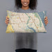 Person holding 20x12 Custom Port St. Lucie Florida Map Throw Pillow in Woodblock