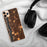 Custom Poughkeepsie New York Map Phone Case in Ember on Table with Black Headphones