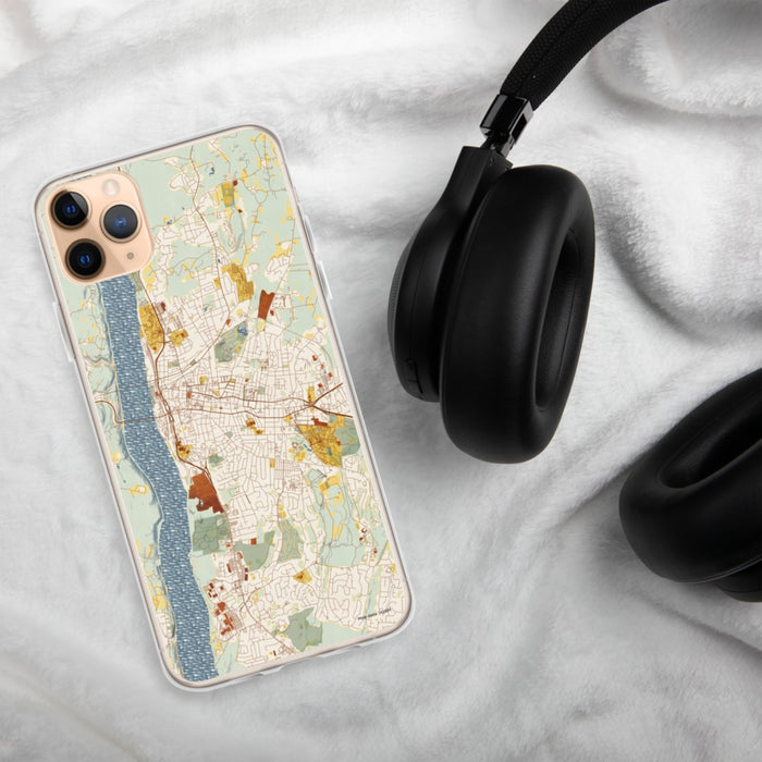Custom Poughkeepsie New York Map Phone Case in Woodblock on Table with Black Headphones