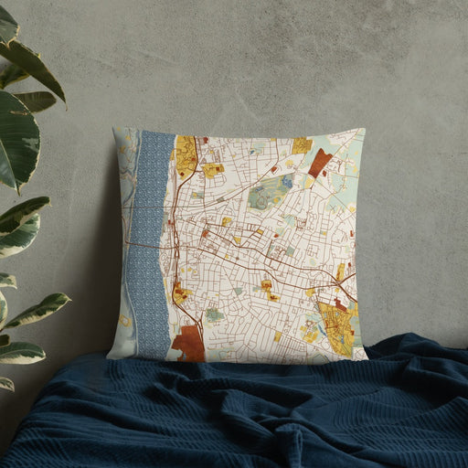 Custom Poughkeepsie New York Map Throw Pillow in Woodblock on Bedding Against Wall