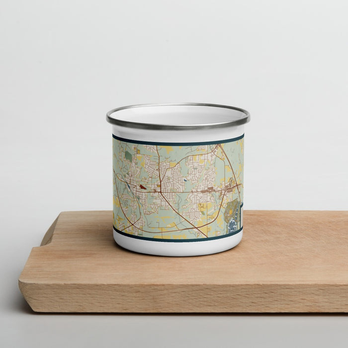 Front View Custom Prattville Alabama Map Enamel Mug in Woodblock on Cutting Board