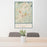 24x36 Prescott Arizona Map Print Portrait Orientation in Woodblock Style Behind 2 Chairs Table and Potted Plant
