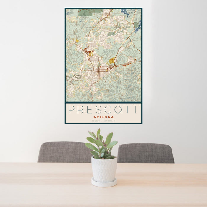 24x36 Prescott Arizona Map Print Portrait Orientation in Woodblock Style Behind 2 Chairs Table and Potted Plant
