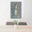 24x36 Priest Lake Idaho Map Print Portrait Orientation in Afternoon Style Behind 2 Chairs Table and Potted Plant